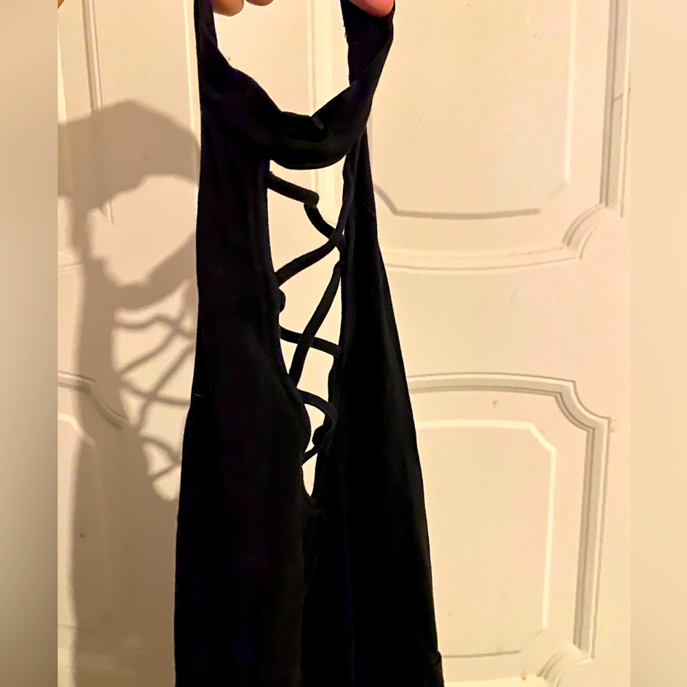 black dress with neck hole and open front